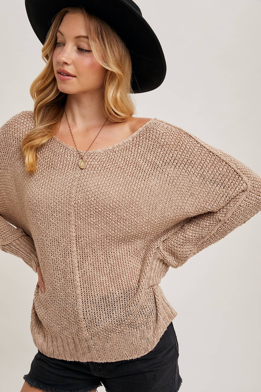 REVERSE SEAM LOOSE FIT SWEATER: TAUPE
